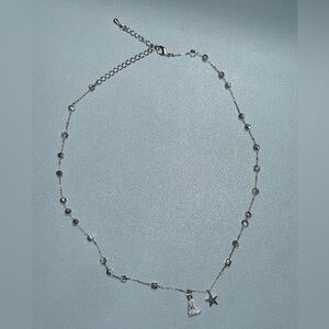 Necklace With Beads, Tassel, and Star Charm